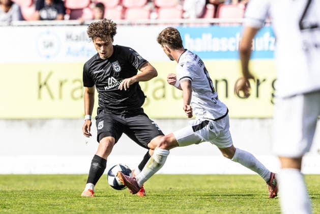 SV Sandhausen vs. SSV Ulm 1846 Soccer, Regionalliga Southwest, Matchday 8, Stadion am Hardtwald, Sandhausen, September 19, 2026; Leander Nicolas Popp, SSV Ulm 1846 Soccer, 33, Niklas Tarnat SV Sandhausen, 6 SV Sandhausen vs. SSV Ulm 1846 Soccer, Regionalliga Southwest, Matchday 8, Stadion am Hardtwald, Sandhausen, September 19, 2026 Photo by Lucca Fundel Sandhausen, Stadion am Hardtwald, Baden-Württemberg, Germany
