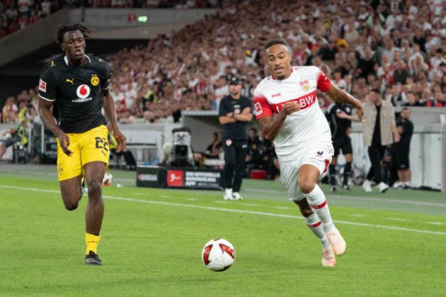 Tackle between Lorenz Assignon (VfB Stuttgart, 22) and Jamie Leweling (VfB Stuttgart, 18), GER, VfB Stuttgart vs. Borussia Dortmund, Soccer, Bundesliga 1, Matchday 4, 2026–2027 season, September 19, 2026, DFL regulations prohibit any use of photographs as image sequences and or quasi-video, GER, VfB Stuttgart vs. Borussia Dortmund, soccer, Bundesliga 1, Matchday 4, 2026–2027 season, September 19, 2026, Stuttgart Copyright: xEibner-Pressefoto EdwardxCheungx EP_ECG