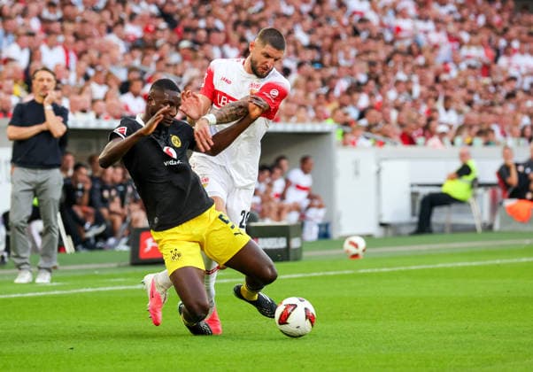 September 19, 2026, Germany, Stuttgart, Bundesliga, VfB Stuttgart vs. Borussia Dortmund, from left: Serhou Guirassy (BVB), Jeff Chabot (VfB)