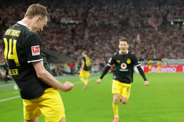 Pictured: Celebration after the goal that made the score 0–1. From left: goal scorer Maximilian Beier of Borussia Dortmund (14) and Konstantinos Karetsas of Borussia Dortmund (19), September 19, 2026, VfB Stuttgart vs. Borussia Dortmund, Bundesliga 1, Matchday 4, Germany, Stuttgart, MHP Arena; DFL regulations prohibit any use of photographs as image sequences and or quasi-video Copyright: HMBxMedia xJulienxBecker