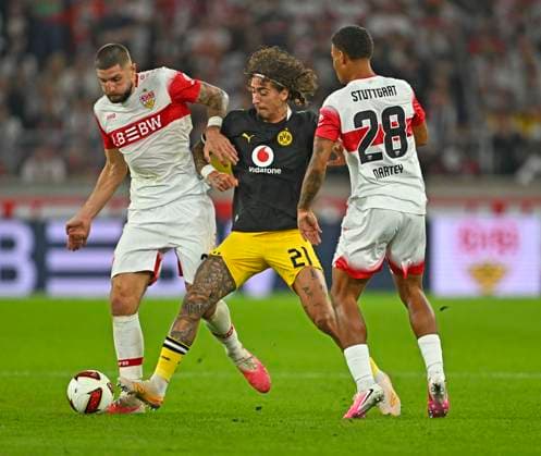 September 19, 2026, Soccer, 1. Bundesliga 2026–2027, Matchday 4, VfB Stuttgart vs. Borussia Dortmund, at the MHP Arena in Stuttgart; from left: Jeff Chabot (Stuttgart), Fabio Silva (Borussia Dortmund), and Nikolas Nartey (Stuttgart)