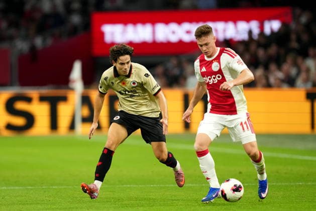 Eredivisie: AFC Ajax v Excelsior Rotterdam Amsterdam - Simon Janssen of Excelsior Rotterdam duels for the ball with Viktor Tsygankov of AFC Ajax Amsterdam during the seventh competition round of the 2026 2027 Eredivisie season. The match is set between AFC Ajax and Excelsior Rotterdam at Johan Cruijff ArenA on 19 September 2026 in Amsterdam, Netherlands. (Hero Images Yannick Verhoeven) Copyright: xYannickxVerhoevenx