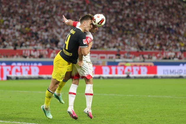September 19, 2026, Germany, Stuttgart, Bundesliga, VfB Stuttgart vs. Borussia Dortmund, Nico Schlotterbeck (Dortmund), Ermedin Demirovic (VfB)