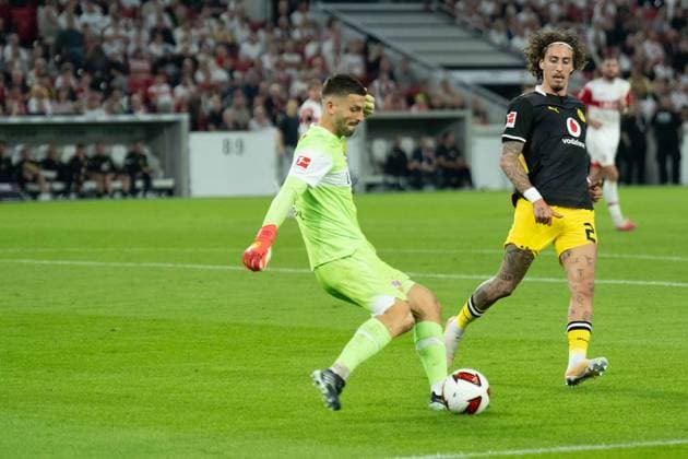 September 19, 2026 Soccer: VfB Stuttgart vs. Borussia Dortmund, Matchday 4 of the Bundesliga 1 at the MHP Arena; Fabian Bredlow (VfB Stuttgart), 1 VS Fabio Silva, Borussia Dortmund, 21 IMPORTANT NOTICE: In accordance with the guidelines of the DFL and the DFB, it is prohibited to use or allow the use of photographs taken in the stadium and or during the game in the form of sequential images and or video-like photo sequences. Copyright: xJamesxZabelx