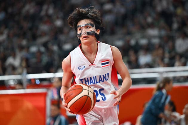 Thailand v China - Asian Games Aichi-Nagoya NAGOYA, JAPAN - SEPTEMBER 19: Sasiporn Wongtapha (25) of Thailand drives the ball during the basketball Women s Group A between Thailand and China on day zero of the 20th Asian Games Aichi-Nagoya at Aichi International Arena on September 19, 2026 in Nagoya, Aichi, Japan. Stringer Anadolu Nagoya Japan. Editorial use only. Please get in touch for any other usage.  Copyright: x2026xAnadoluxStringerx