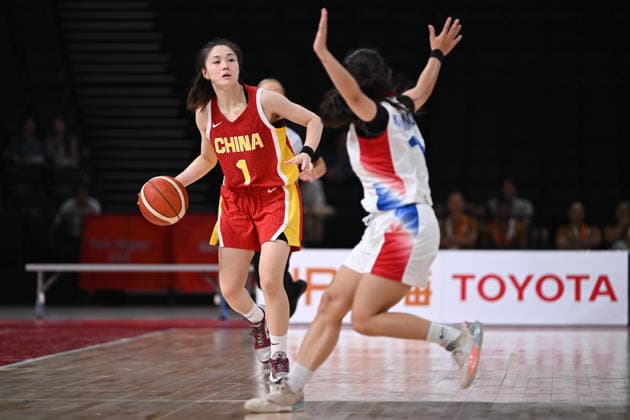 Thailand v China - Asian Games Aichi-Nagoya NAGOYA, JAPAN - SEPTEMBER 19: Manman Zhang (1) of China drives the ball during the basketball Women s Group A between Thailand and China on day zero of the 20th Asian Games Aichi-Nagoya at Aichi International Arena on September 19, 2026 in Nagoya, Aichi, Japan. Stringer Anadolu Nagoya Japan. Editorial use only. Please get in touch for any other usage.  Copyright: x2026xAnadoluxStringerx