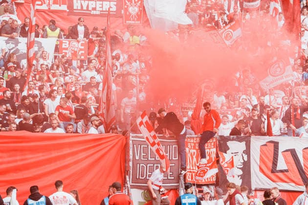 Germany Soccer 3rd Division 2026–2027, Matchday 7: Alemannia Aachen vs. Fortuna Düsseldorf at Tivoli Aachen—red smoke in the Fortuna visitors section, away fans, pyrotechnics, fireworks Copyright: xThiemoxRudolphx