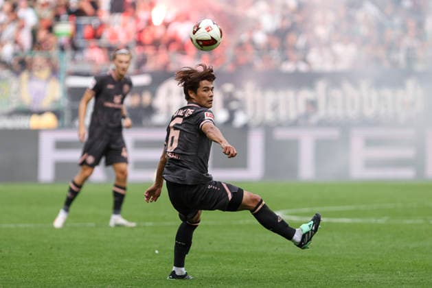 Kaishu Sano of 1 FSV Mainz 05 in action, on the ball, making a solo run during the Bundesliga match between Borussia Mönchengladbach and 1 FSV Mainz 05 at Borussia Park on September 19, 2026, in Mönchengladbach, Germany. Photo by Oliver Kaelke, DeFodi Images. Kaishu Sano of 1 FSV Mainz 05 controls the ball during the Bundesliga match between Borussia Mönchengladbach and 1 FSV Mainz 05 at ista Borussia Park on September 19, 2026 in Mönchengladbach, Germany. Photo by Oliver Kaelke, DeFodi Images. DFB and DFL regulations prohibit any use of photographs as image sequences and or quasi-video. Photo by Oliver Kaelke, DeFodi Images.