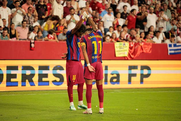 Lamine Yamal and Raphinha seen celebrating after scoring goal during LaLiga 2026 2027 game between teams of Sevilla FC and FC Barcelona, Barca (Maciej Rogowski Ball Raw Images) Seville Estadio Ramon Sanchez Pizjuan Spain Copyright: xMaciejxRogowskix maciejrogowski_sevillafc_fcbarcelona_2627-2