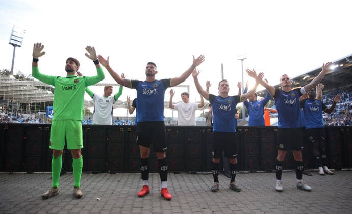 September 19, 2026, Soccer, Men s, 3rd Division, 2026–2027 Season, 1 FC Saarbrücken vs. SG Sonnenhof Großaspach, The 1 FC Saarbrücken team celebrates their victory in front of the fan section after the game; final celebration, Matteo Bignetti (1 FC Saarbrücken), Kai Brünker (1 FC Saarbrücken), Patrick Sontheimer (1 FC Saarbrücken), and Florian Pick (1 FC Saarbrücken), Saarbrücken, Ludwigsparkstadion, Saarland, Germany Copyright: xFabianxKleerx