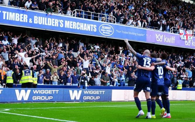 Camiel Neghli of Millwall celebrates scoring a goal after making it 2-0 with fans Millwall v West Ham United, EFL Sky Bet Championship, Football, The Den, London, UK - 19 Sep 2026London The Den United Kingdom EDITORIAL USE ONLY No use with unauthorised audio, video, data, fixture lists, club league logos or live services. Online in-match use limited to 120 images, no video emulation. No use in betting, games or single club league player publications. Copyright: xJavierxGarcia Shutterstockx 17158528dj