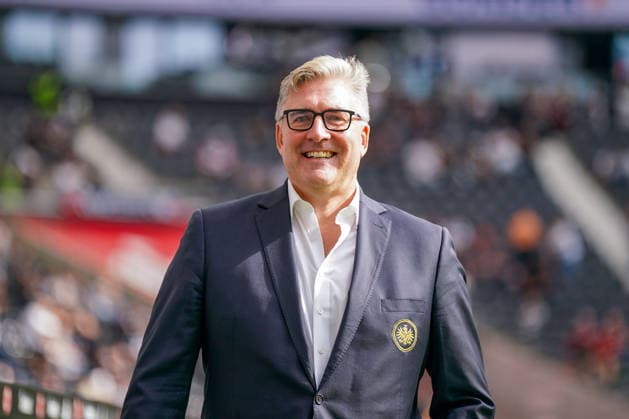Germany Soccer Bundesliga 2026–2027, Matchday 4: Eintracht Frankfurt vs. SC Freiburg at Deutsche Bank Park in Frankfurt. Axel Hellmann, Spokesman for the Executive Board of Eintracht Frankfurt Fußball AG, smiles before the Bundesliga match at Deutsche Bank Park. Portrait, half-length, Eintracht Frankfurt, Axel Hellmann, Board Member, Spokesperson for the Executive Board, Official, Club Leadership, Management, Soccer, Bundesliga, Deutsche Bank Park, Stadium, Sports Facility, Business, Economy, Sports Business, Club Logo Copyright: xJOERANxSTEINSIEKx