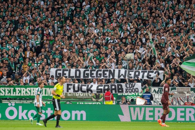 German Soccer 1st Bundesliga, Matchday 4, 2026–2027, Werder Bremen vs. FC Augsburg on September 19, 2026, at the Weserstadion in Bremen—Fans, banner, flag, sign: Money vs. Values F¦ SAAB Copyright: xSvenxHeidmannx