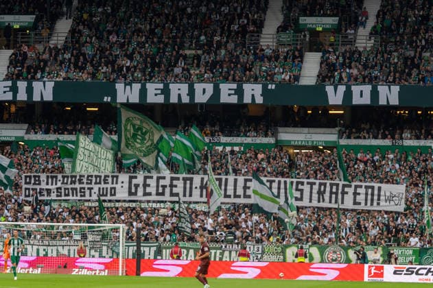 German Soccer 1st Bundesliga, Matchday 4, 2026–2027, Werder Bremen vs. FC Augsburg on September 19, 2026, at the Weserstadion in Bremen—Fans, banners, flags, and signs. Whether in Dresden or anywhere else: Against collective punishments Copyright: xSvenxHeidmannx