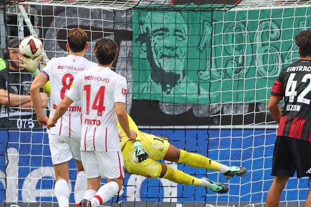 Frankfurt, Germany September 19, 2026 Bundesliga 2026–2027 Matchday 4 Eintracht Frankfurt vs. SC Freiburg Pictured: Goalkeeper Noah Atubolu of Frankfurt just manages to get his fingertips to the ball DFL and DFB regulations prohibit any use of photographs as image sequences and or quasi-video Deutsche Bank Park Hesse Copyright: xFotostandx xRacochax