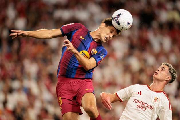 September 19, 2026, Seville, Spain: Andreas Christensen FC Barcelona, Barca and Robbie Ure (Sevilla FC) seen in action during LaLiga EA SPORTS 2026 2027 game between teams of Sevilla FC and FC Barcelona. Seville Spain - ZUMAs197 20260919_aaa_s197_293 Copyright: xMaciejxRogowskix