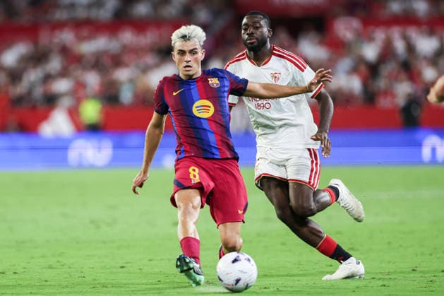 September 19, 2026, Sevilla, Sevilla, Spain: Pedri of FC Barcelona, Barca and Youssouf Fofana of Sevilla FC in action during the Spanish league, LaLiga EA Sports, football match played between Sevilla FC and FC Barcelona at Ramon Sanchez-Pizjuan stadium on September 19, 2026, in Sevilla, Spain. Sevilla Spain - ZUMAa181 20260919_zaa_a181_609 Copyright: xIrinaxR.xHipolitox