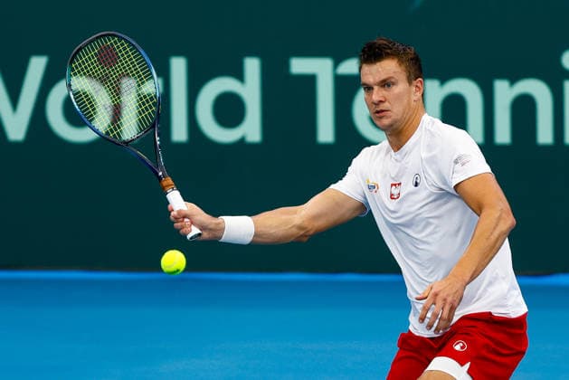 TENNIS DAVIS CUP AUSTRALIA POLAND, Karol Drzewiecki of Poland plays a forehand during a Doubles match against Max Purcell and Rinky Hijikata of Australia during the Davis Cup match between Australia and Poland at Pat Rafter Arena in Brisbane, Sunday, September 20, 2026. ( NO ARCHIVING, EDITORIAL USE ONLY  Copyright: xRUSSELLxFREEMANx 20260920198900710153