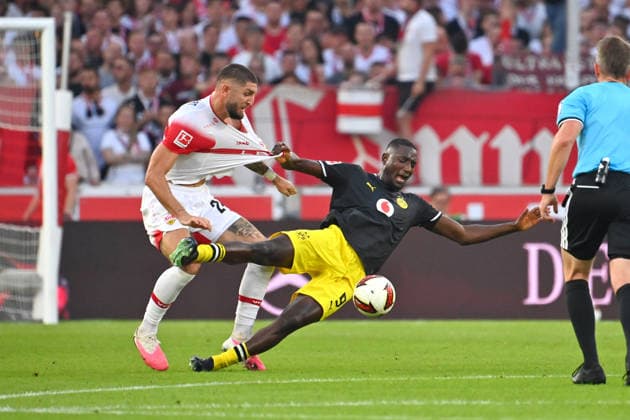 Jeff CHABOT, VFB Stuttgart, Action, Tackle against Serhou GUIRASSY, DO Soccer, Bundesliga Season 2026–2027, Matchday 4, VfB Stuttgart vs. Borussia Dortmund 0–1 on September 19, 2026, MHP ARENA