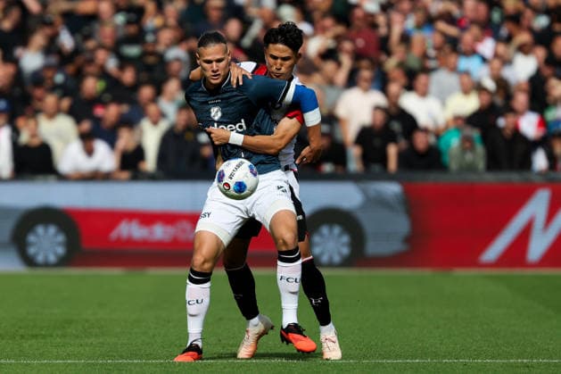 2026-09-20 Feyenoord v FC Utrecht - Dutch Eredivisie ROTTERDAM, NETHERLANDS - SEPTEMBER 20: Tsuyoshi Watanabe of Feyenoord battles for the ball with Artem Stepanov of FC Utrecht during the Dutch Eredivisie match between Feyenoord and FC Utrecht at Stadion Feijenoord on September 20, 2026 in Rotterdam, Netherlands. Rotterdam Stadion Feijenoord Netherlands Content not available for redistribution in The Netherlands directly or indirectly through any third parties. Copyright: xHansxvanxderxValkx