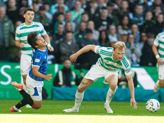 20.09.2026 Celtic v Rangers: Liam Scales of Celtic fouls Minsu Kim of Rangers  Copyright: xWilliexVassx NINTCHDBPICT001109853355