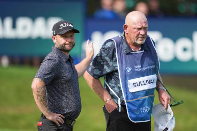 VIRGINIA WATER, ENGLAND - SEPTEMBER 20: Andy Sullivan (ENG) celebrates with his caddie Guy Tilston after he holed a birdie putt on the eighteenth green to take the lead during Round 4 at the BMW PGA, Golf Herren Championship at Wentworth Golf Club, Virginia Water on September 20, 2026 in Surrey, England The BMW PGA Championship
