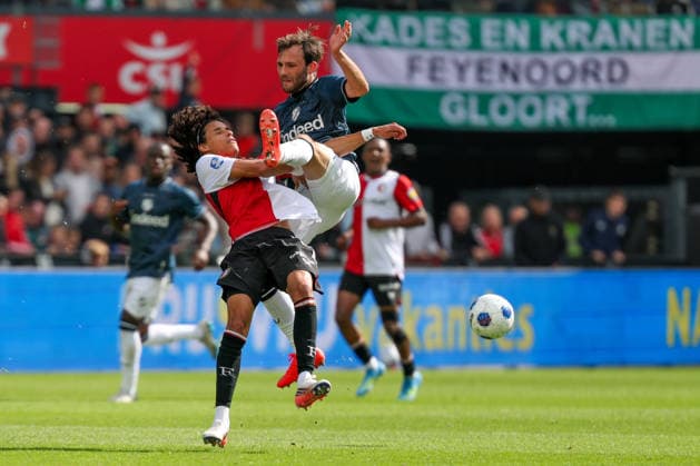 2026-09-20 Feyenoord v FC Utrecht - Dutch Eredivisie ROTTERDAM, NETHERLANDS - SEPTEMBER 20: Gjivai Zechiel of Feyenoord battles for the ball with Joris van Overeem of FC Utrecht during the Dutch Eredivisie match between Feyenoord and FC Utrecht at Stadion Feijenoord on September 20, 2026 in Rotterdam, Netherlands. Rotterdam Stadion Feijenoord Netherlands Content not available for redistribution in The Netherlands directly or indirectly through any third parties. Copyright: xHansxvanxderxValkx