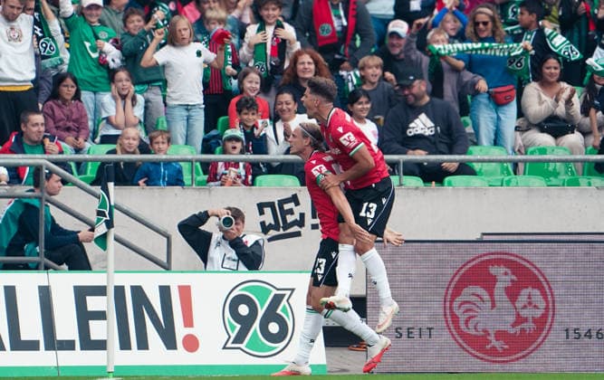 Germany Soccer 2. Bundesliga 2026–2027, Matchday 6: Hannover 96 vs. VfL Bochum at Heinz von Heiden Arena Stadium in Hannover—goal and goal celebration by Stefan Teitur Ørðarson, Stefan Teitur Thordarson (Hannover 96), 23 Franz Roggow (Hannover 96), 13 Copyright: xAymanxAlahmedx