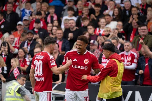 September 20, 2026: Energie Cottbus vs. FC St. Pauli, Matchday 6 of the 2. Bundesliga at the LEAG Energie Stadium—Justin Butler of Energie Cottbus celebrates his goal, making the score 1–0 for Energie Cottbus. IMPORTANT NOTICE: In accordance with the guidelines of the DFL and the DFB, it is prohibited to use or allow the use of photographs taken in the stadium and or during the game in the form of sequential images and or video-like photo sequences Copyright: xJamesxZabelx