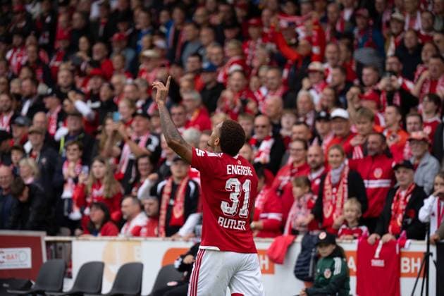 September 20, 2026: Energie Cottbus vs. FC St. Pauli, Matchday 6 of the 2. Bundesliga at the LEAG Energie Stadium—Justin Butler of Energie Cottbus celebrates his goal, making the score 1–0 for Energie Cottbus. IMPORTANT NOTICE: In accordance with the regulations of the DFL and the DFB, it is prohibited to use or allow the use of photographs taken in the stadium and or during the game in the form of sequential images and or video-like photo sequences Copyright: xJamesxZabelx