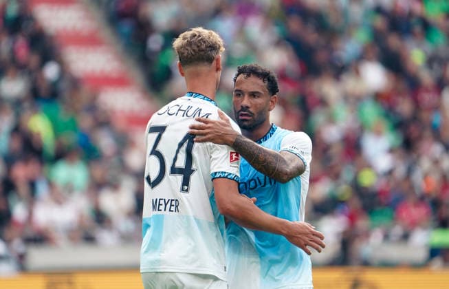 Germany Soccer 2. Bundesliga 2026–2027, Matchday 6: Hannover 96 vs. VfL Bochum at Heinz von Heiden Arena Stadium in Hannover—Gestures, Body Language, Emotion: Sean Klaiber (VfL Bochum), 2; Tom Meyer (VfL Bochum), 34 Copyright: xAymanxAlahmedx