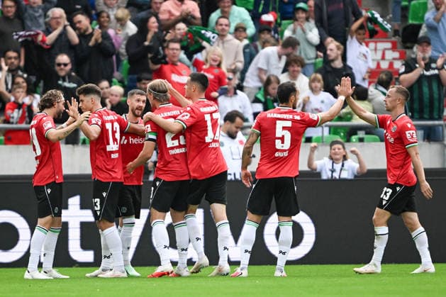 2. Bundesliga: Hannover 96 vs. VfL Bochum on September 20, 2026, at the HDI Arena in Hannover—cheers, goal celebrations, Goal scorers: Marcel Hartel (Hannover) celebrates after scoring the 2–0 goal with Stefan Teitur Thordarson (Hannover), Bastian Allgeier (Hannover), Virgil Ghita (Hannover), Franz Roggow (Hannover), Kolja Oudenne (Hannover), and Franz Roggow (Hannover) MT