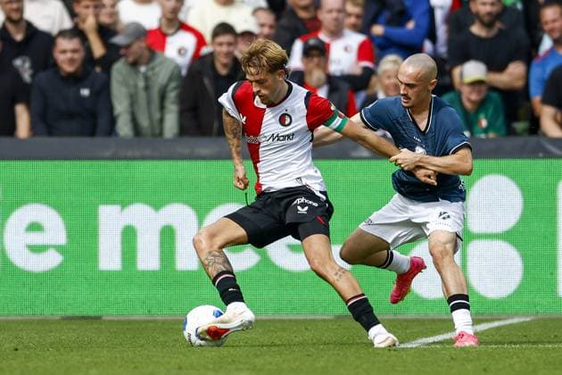 FEYENOORD, 20-09-2026 , Stadium Feijenoord De Kuip , season 2026 2027 , Dutch Eredivisie football , match between Feyenoord and FC Utrecht , picture shows Feyenoord player Luciano Valente and FC Utrecht player Marius Broholm Feyenoord - Utrecht  x207316848x Copyright: