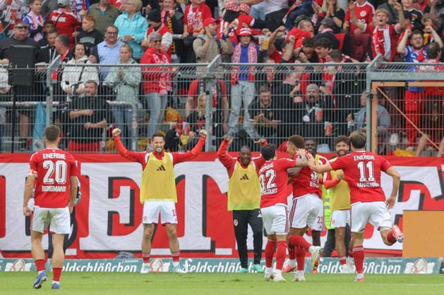 September 20, 2026, xtgx, Soccer 2. Bundesliga, FC Energie Cottbus vs. FC St. Pauli, from left: Justin Butler (Cottbus), 31, celebrating, Goal celebration, celebrating the goal, DFL and DFB regulations prohibit any use of photographs as image sequences and or quasi-video, Cottbus