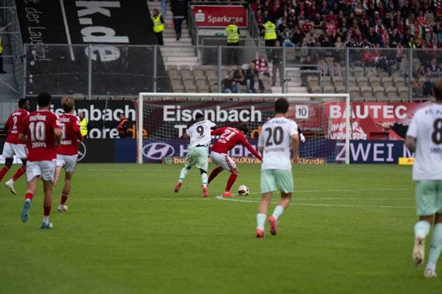 September 20, 2026: Energie Cottbus vs. FC St. Pauli, Matchday 6 of the 2. Bundesliga at the LEAG Energie Stadium; tackle between Abdoulie Ceesay (FC St. Pauli) and Luca Erlein (Energie Cottbus), 21 IMPORTANT NOTICE: In accordance with DFL and DFB regulations, it is prohibited to use or allow the use of photographs taken in the stadium and or during the game in the form of sequential images and or video-like photo series. Copyright: xJamesxZabelx