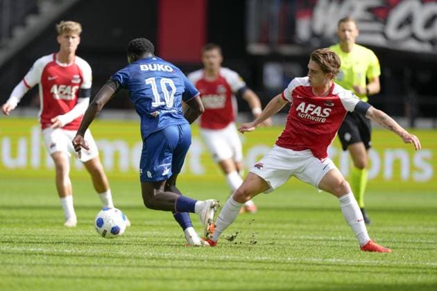 ALKMAAR , 20-09-2026 , AFAS Stadion , season 2026 2027 , Dutch Eredivisie football , match between AZ and Telstar , Picture shows Telstar player Tyrone Owusu , AZ player Valdemar Byskov AZ - Telstar  x207317944x Copyright: