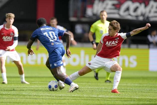 ALKMAAR , 20-09-2026 , AFAS Stadion , season 2026 2027 , Dutch Eredivisie football , match between AZ and Telstar , Picture shows Telstar player Tyrone Owusu , AZ player Valdemar Byskov AZ - Telstar  x207317957x Copyright: