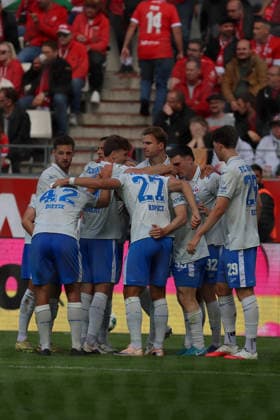 Essen, Germany, September 20, 2026; 3rd League 2026–2027, Matchday 7: Rot-Weiss Essen vs. FC Hansa Rostock. Hidden in the photo: goal scorer Maximilian Krauß (FCH) celebrates with his teammates after scoring the 1–0 goal, group celebration with the team. DFB and DFL regulations prohibit any use of photographs as image sequences and or quasi-video. Stadion an der Hafenstraße, North Rhine-Westphalia Copyright: xFotostandx xFWMEDIAx