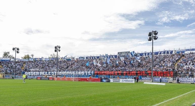 The Löwen fans in the West Stand with a banner reading Against all stadium bans—Freedom for Ultras GER, TSV 1860 Munich vs. 1. FC Nuremberg II U23, soccer, Bavarian Regional League, Matchday 10, 2026–2027 season, September 20, 2026. DFL and DFB regulations prohibit any use of photographs as image sequences and or quasi-video. Photo: HMB Media, Heike Feiner Copyright: HMBxMedia HeikexFeiner