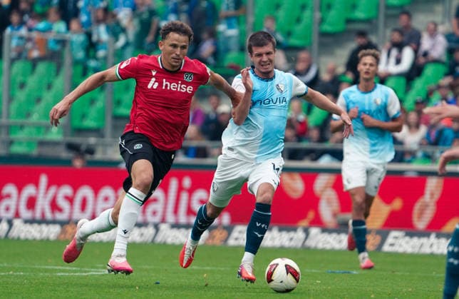 Germany Soccer 2. Bundesliga 2026–2027, Matchday 6: Hannover 96 vs. VfL Bochum at Heinz von Heiden Arena Stadium in Hannover; Benedikt Pichler of Hannover 96 in a tackle, 11 Copyright: xAymanxAlahmedx