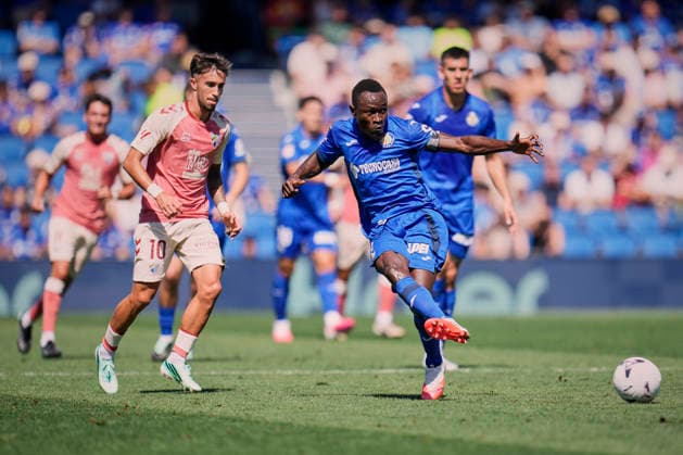 September 20, 2026, Getafe, Madrid, Spain: Dakonam Djene of Getafe CF and David Larrubia of Malaga CF during the Spanish League, LaLiga EA Sports, football match played between Getafe CF and Malaga CF at Coliseum de Getafe stadium on September 20, 2026, in Getafe, Madrid, Spain. Getafe CF V Malaga CF - LaLiga EA Sports - ZUMAa181 20260920_zaa_a181_014 Copyright: xAngelxPerezxMecax