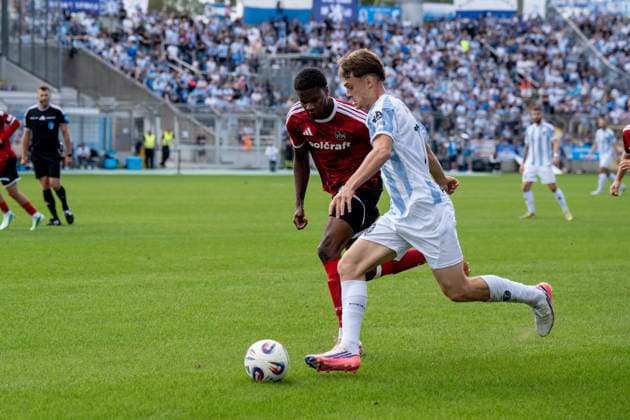 Men s Soccer, Bavarian Regional League, 2026–2027 Season, Matchday 10, September 20, 2026: TSV 1860 Munich vs. 1. FC Nuremberg II. Emre Erdogan of TSV 1860 Munich in a tackle with Winners Osawe of 1. FC Nuremberg II L Munich Stadium on Grünwalder Straße Bavaria Germany