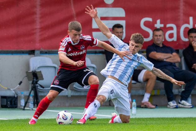 Men s Soccer, Bavarian Regional League, 2026–2027 Season, Matchday 10, September 20, 2026: TSV 1860 Munich vs. 1. FC Nuremberg II. Tobias Heß of 1. FC Nuremberg II (L) in a tackle with Mark Gevorgyat TSV 1860 Munich’s stadium on Gruenwalder Strasse, Bavaria, Germany