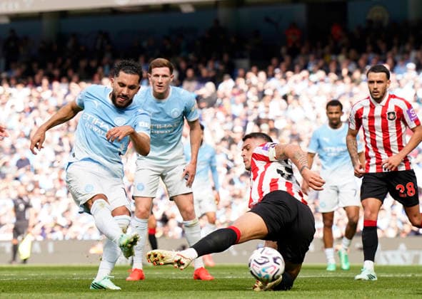 Manchester, England, 20th September 2026. Rayan Cherki of Manchester City scoring their second goal (2-1) during the Manchester City vs Sunderland Premier League match at the Etihad Stadium, Manchester. Picture credit should read: Andrew Yates Sportimage EDITORIAL USE ONLY. No use with unauthorised audio, video, data, fixture lists, club league logos or live services. Online in-match use limited to 120 images, no video emulation. No use in betting, games or single club league player publications. SPI_041_AY_ManCity_Sunderland SPI-5012-0041