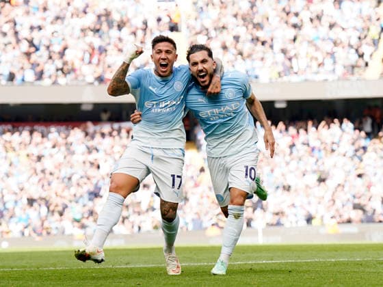 Manchester, England, 20th September 2026. Rayan Cherki of Manchester City9r) celebrates scoring their second goal (2-1) with Enzo Fernandez of Manchester City (l) during the Manchester City vs Sunderland Premier League match at the Etihad Stadium, Manchester. Picture credit should read: Andrew Yates Sportimage EDITORIAL USE ONLY. No use with unauthorised audio, video, data, fixture lists, club league logos or live services. Online in-match use limited to 120 images, no video emulation. No use in betting, games or single club league player publications. SPI_044_AY_ManCity_Sunderland SPI-5012-0044