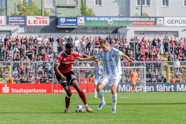 Battle for the Ball: Tackle between Winners Osawe (1. FC Nuremberg II U23, 38) and Dennis Dressel (TSV 1860 Munich, 14), GER, TSV 1860 Munich vs. 1 FC Nuremberg II U23, soccer, Bavarian Regional League, Matchday 10, 2026–2027 season, September 20, 2026 DFL DFB REGULATIONS PROHIBIT ANY USE OF PHOTOGRAPHS AS IMAGE SEQUENCES AND OR QUASI-VIDEO Photo: HMB Media, Heike Feiner Copyright: HMBxMedia HeikexFeiner
