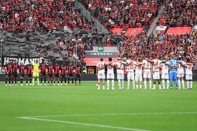 The Bayer 04 Leverkusen and RB Leipzig teams during the minute of silence in honor of Peter Herrmann during the Bundesliga match between Bayer 04 Leverkusen and RB Leipzig at BayArena on September 20, 2026, in Leverkusen, Germany Photo by Oliver Kaelke DeFodi Images Teams from Bayer 04 Leverkusen and RB Leipzig during the minute of silence in honor of Peter Herrmann during the Bundesliga match between Bayer 04 Leverkusen and RB Leipzig at BayArena on September 20, 2026 in Leverkusen, Germany. Photo by Oliver Kaelke, DeFodi Images. DFB and DFL regulations prohibit any use of photographs as image sequences and or quasi-video. Photo by Oliver Kaelke, DeFodi Images.