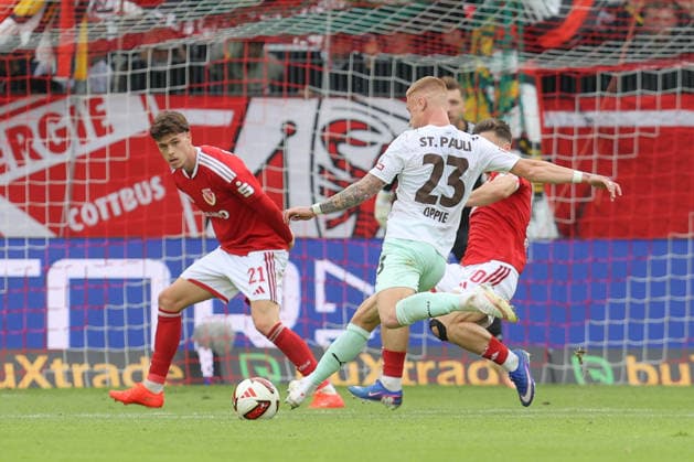 September 20, 2026, xtgx, Soccer 2. Bundesliga, FC Energie Cottbus vs. FC St. Pauli, from left: Louis Oppie (St. Pauli), No. 23, shoots the ball toward the goal, shot on goal, shot DFL DFB REGULATIONS PROHIBIT ANY USE OF PHOTOGRAPHS as IMAGE SEQUENCES and or QUASI-VIDEO Cottbus