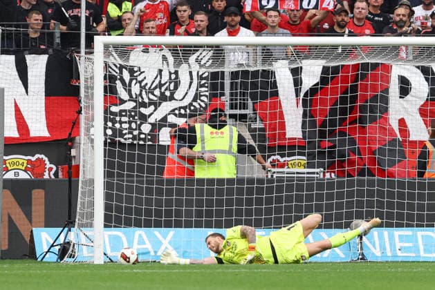 Goalkeeper Mark Flekken of Bayer 04 Leverkusen in action, on the ball, making a solo play during the Bundesliga match between Bayer 04 Leverkusen and RB Leipzig, BayArena on September 20, 2026, in Leverkusen, Germany. Photo by Oliver Kaelke, DeFodi Images. Goalkeeper Mark Flekken of Bayer 04 Leverkusen controls the ball during the Bundesliga match between Bayer 04 Leverkusen and RB Leipzig at BayArena on September 20, 2026 in Leverkusen, Germany. Photo by Oliver Kaelke, DeFodi Images. DFB and DFL regulations prohibit any use of photographs as image sequences and or quasi-video. Photo by Oliver Kaelke, DeFodi Images.