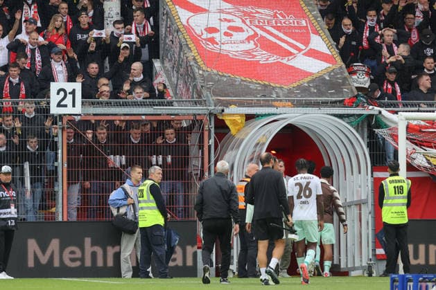 September 20, 2026, xtgx, Soccer 2. Bundesliga, FC Energie Cottbus vs. FC St. Pauli, from left: Cottbus fans display a crossed-out hammer and sickle emblem; communism, socialism; DFL and DFB regulations prohibit any use of photographs as image sequences and or quasi-video; Cottbus